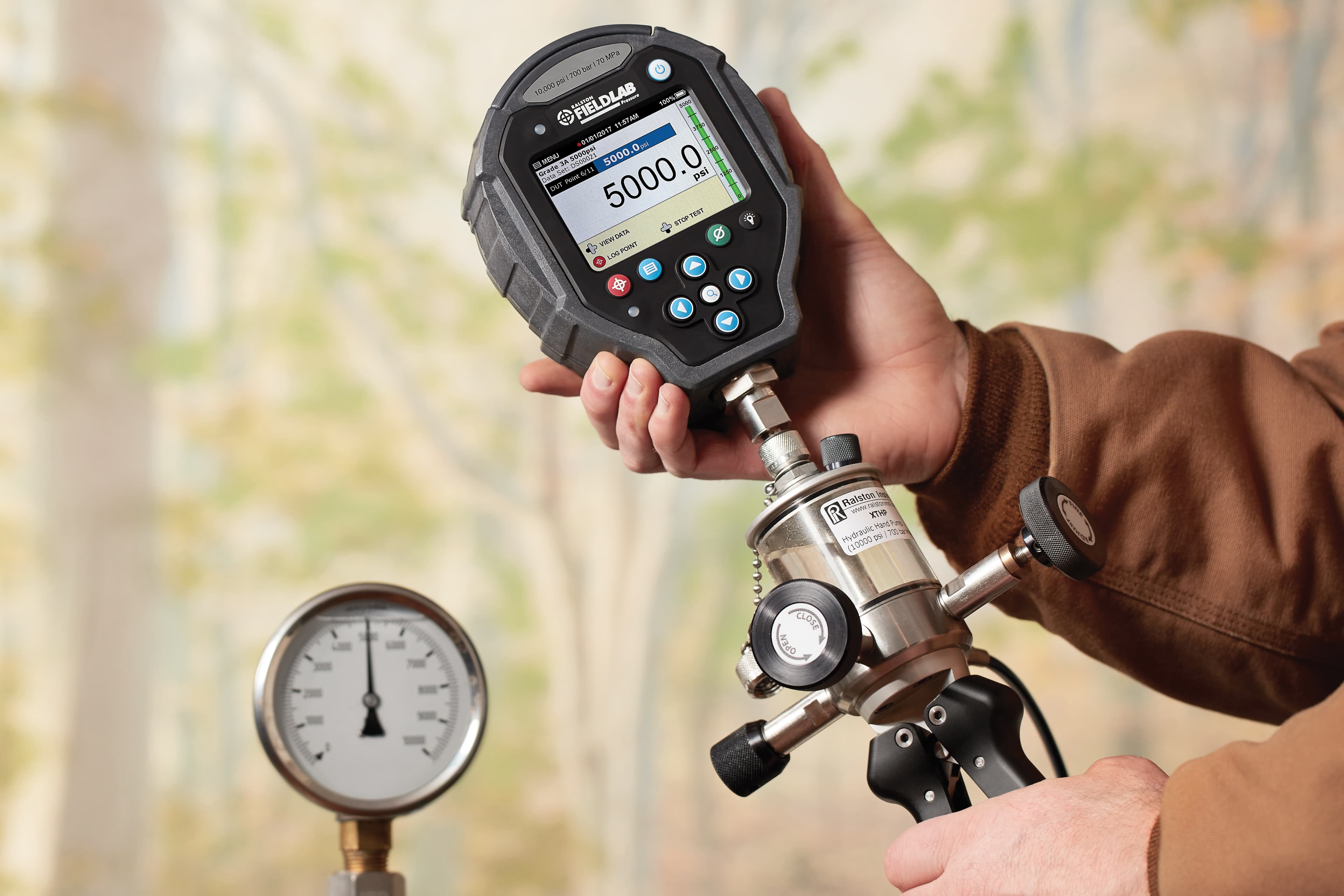 Ralston pressure gauges and calibrators used for field pressure calibration